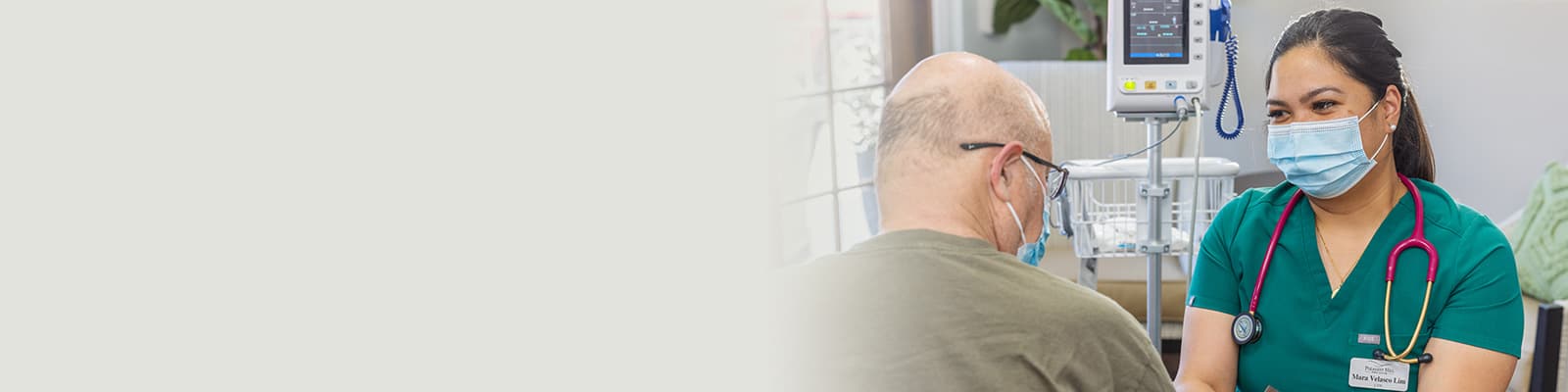 a nurse with a resident at the Pleasant Hill Post Acute facility